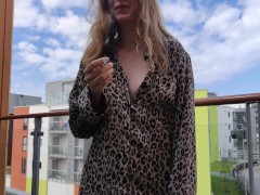 Smoking on the balcony in my leopard PJs