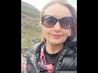 Smoke break during a bike ride in the mountains - sexy rider Smoking cigarette