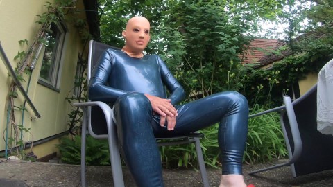 Chilling in Neckentry Latex Catsuit from Latex-Line