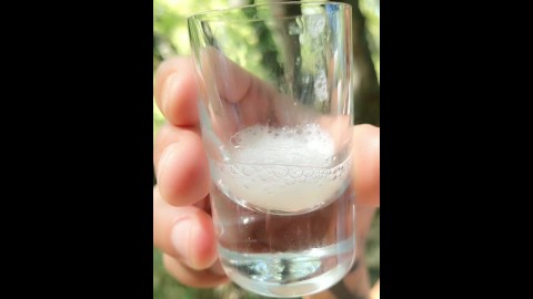 Spitting guy´s thick cum to the glass and drinking it again after blowjob outdoor
