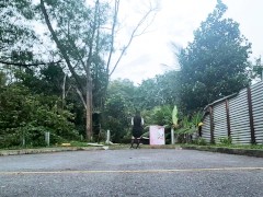 Sissy in chastity catwalk outdoors