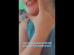 Playing with my sharp sharp teeth. (Tongue piercing(