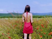 Preview 1 of Slim beauty pleases herself in a flower field