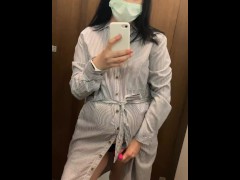Pregnant beauty masturbates in a clothing store and tries on dresses