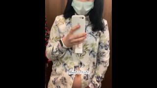 Pregnant beauty masturbates in a clothing store and tries on dresses