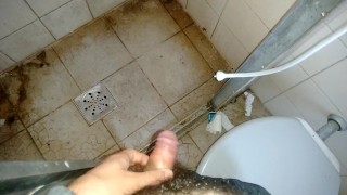 huge piss in public bathroom 