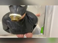 LATEX CATSUIT AND GASMASK SHOWER FUN