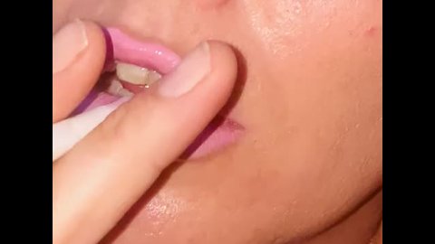 Bimbo lips smoking cigarette