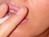 Bimbo lips smoking cigarette