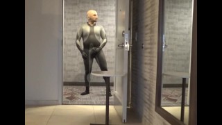 showing dolphin wetsuit bulge and silicone mask at hotel door and window, no cum