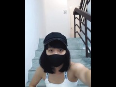 Crossdresser masturbating publicly on stairs
