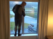Preview 3 of silicone masked wetsuited guy gets horny at hotel window and humps his pillows