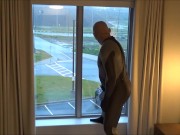 Preview 4 of silicone masked wetsuited guy gets horny at hotel window and humps his pillows