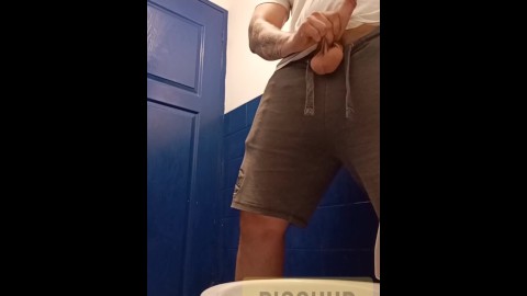 Hung jock loud piss in the gym toilet