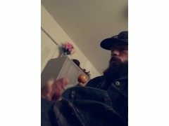 Bearded biker jacks off moans and cums