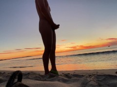 Masturbating on a beach in the morning