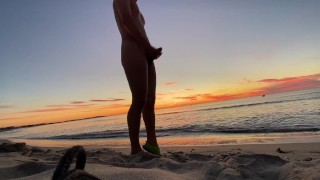 Masturbating on a beach in the morning