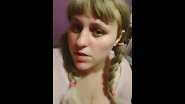 Smoking a cigarette in pink with braids 
