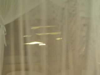 Busty slut dances on the bed and strips to get you hard