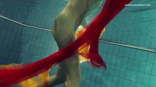 Blonde super tight teen Nastya underwater