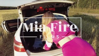Fitness girl Mia Fire fucked in the field by the car