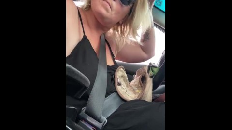 Milkymama awkwardly flashes drivers while driving topless