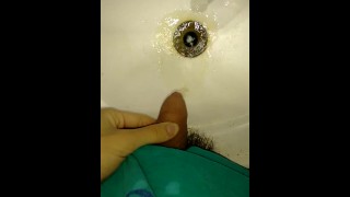 yellow piss in sink