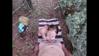 Redhead with big boobs sucks dick and swallows load in the woods