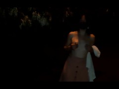 Naked girl walking in the city at night