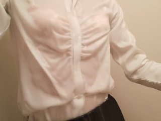 Taking a shower while crossdressing. (pink bra is seen through the blouse)