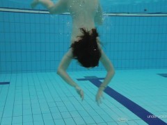 Red swimsuit beauty Katy with bushy pussy underwater