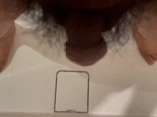 Chubby Japanese guy pees in the bathroom drain