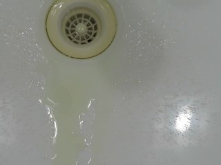 pissing in wash basin.