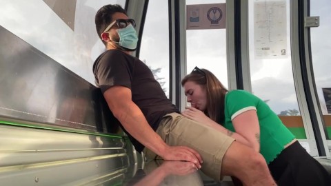 Giving a blowjob on public transportation