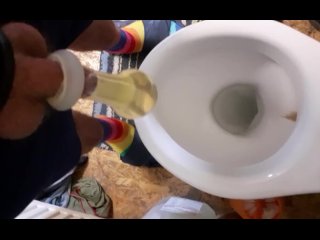 Having fun pissing in condom