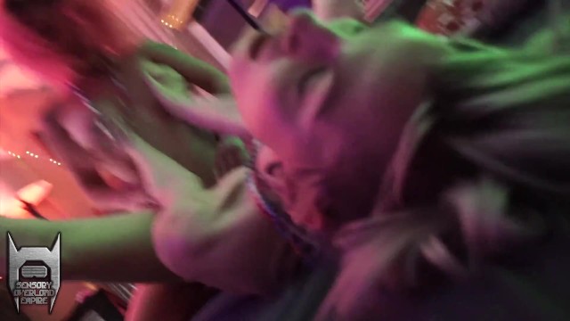 Horney girls fuck each other on the floor at a party