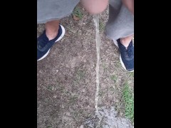 Pissing into the wind during a summer storm splashing all over me