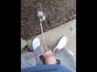 Fast Pissing outside in between Thunderstorms