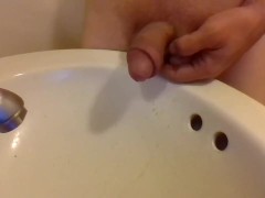 Peeing Draped Over A Sink