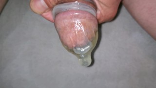 Filling condom with piss