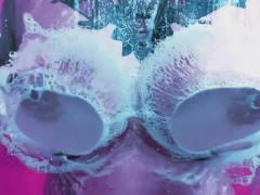 Hot chick washing her boobs in a foamy shower - Screenshot 4 of 16 - Wet