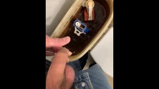 Pissing into foreskin, horny and cum in public toilet