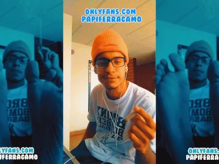 beautiful boy shows his feet while smoking