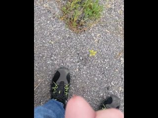 Taking a piss on country road