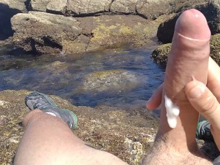 Jerking off a Big Hard Dick Overlooking the Sea in the Public Cove until he Cums