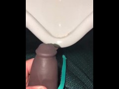 Using a hollow Cock Sleeve Packer Device to go Pee into a Urinal for the first time
