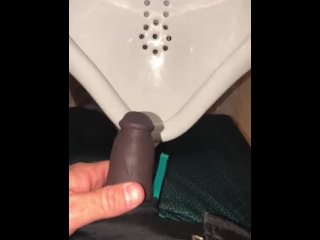 Using a hollow Cock Sleeve Packer Device to go Pee into a Urinal for the first time
