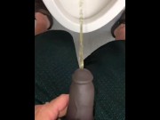 Preview 2 of POV Pissing thru my hollow cock sleeve device in a public washroom then tasting the last few P drops