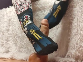 Girl in Socks makes Footjob on a Big Dildo