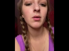 Giantess looks to tiny man before eating